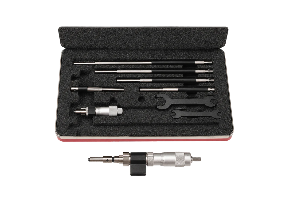 Custom product illustration representing a Starrett 124AZ solid-rod inside micrometer set with fitted case